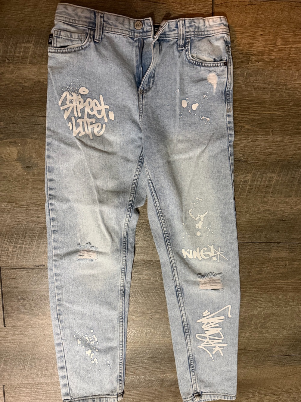 Light Blue Distressed Graffiti Women’s Jeans